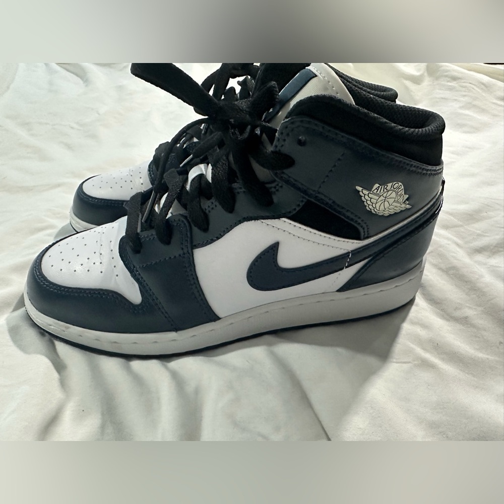 Jordan Black and White Mid-Top Sneakers